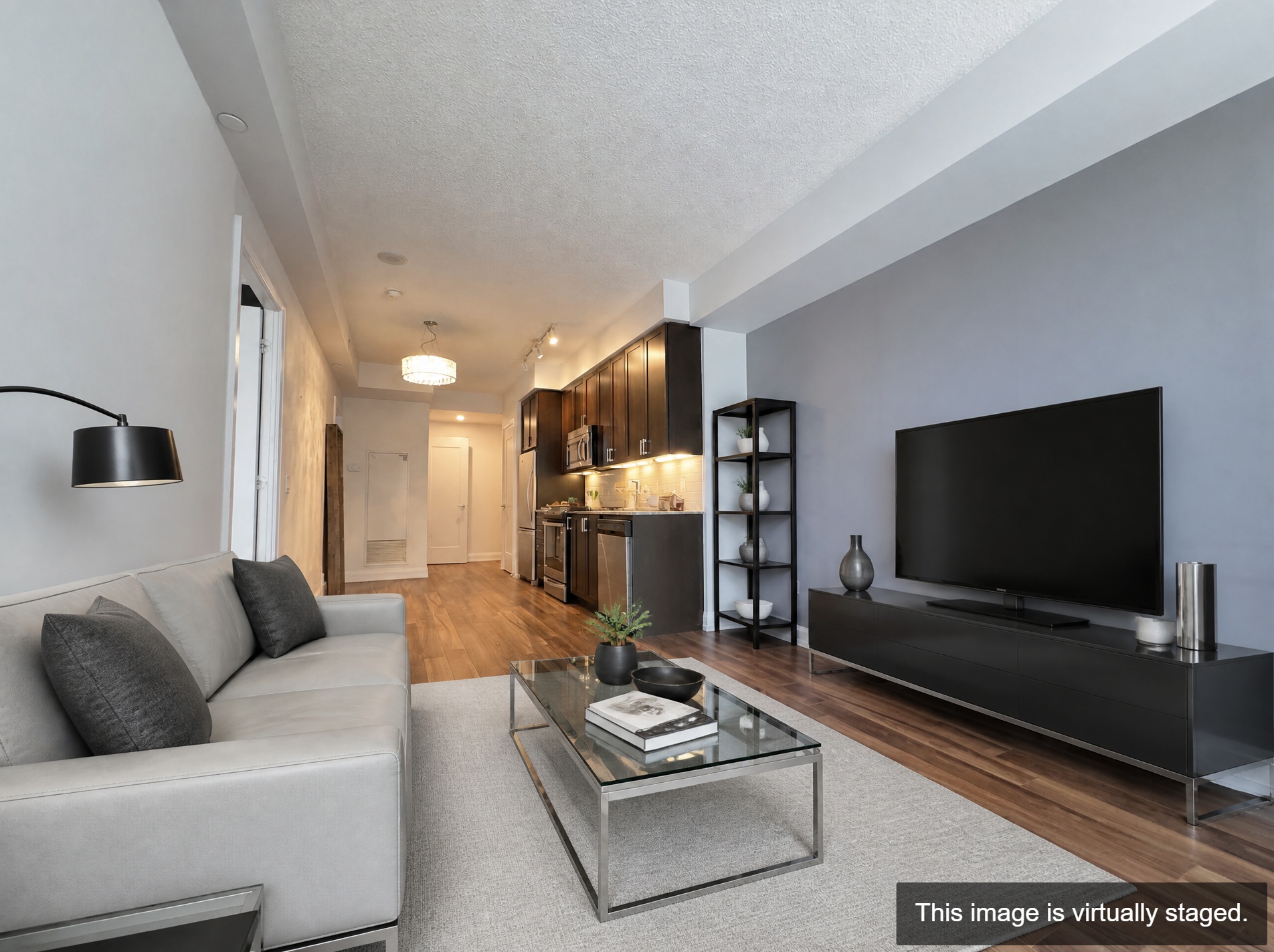 Virtually staged — primary bedroom with ensuite