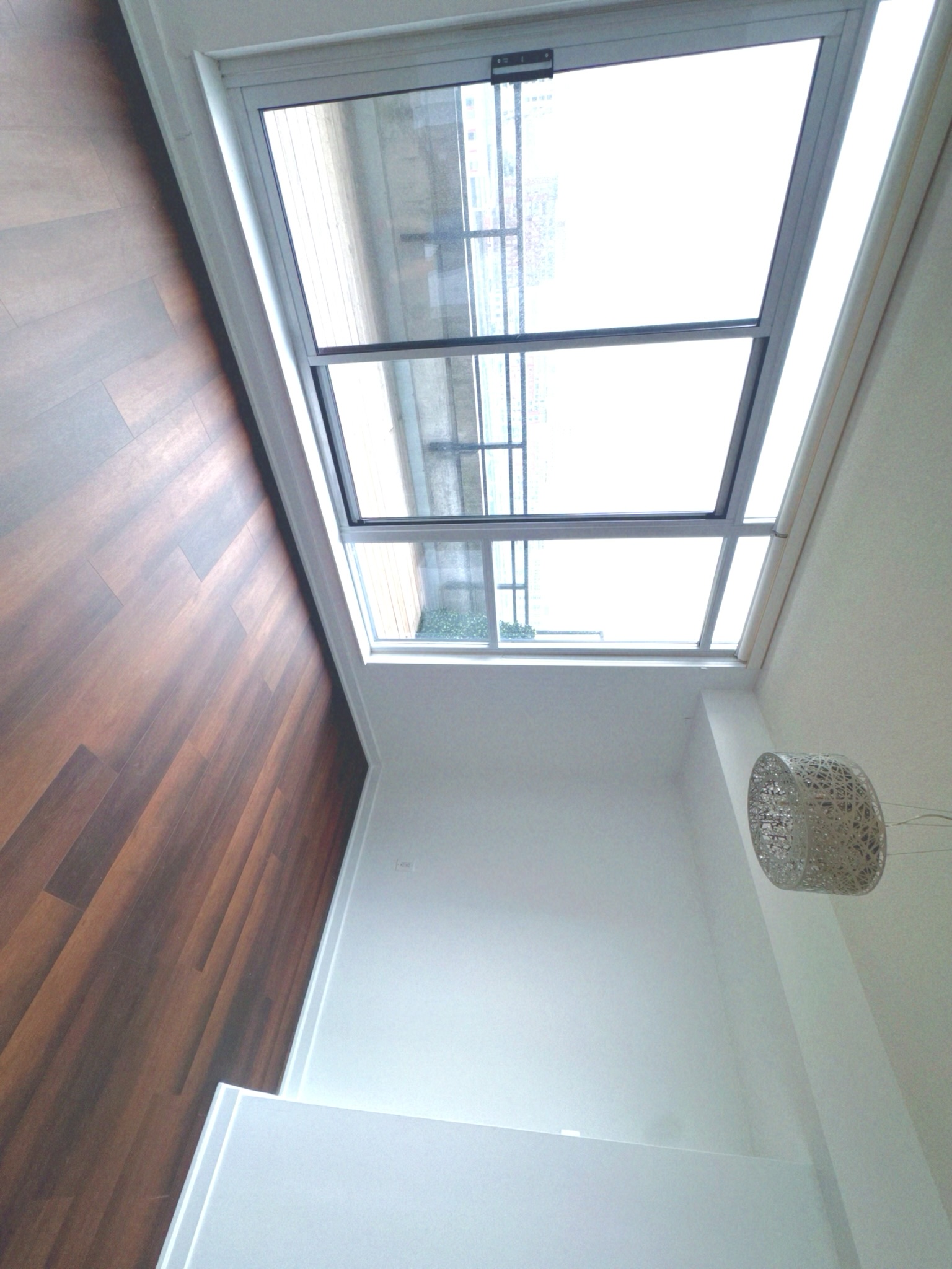 Dining area overlooking park with walk-out to balcony
