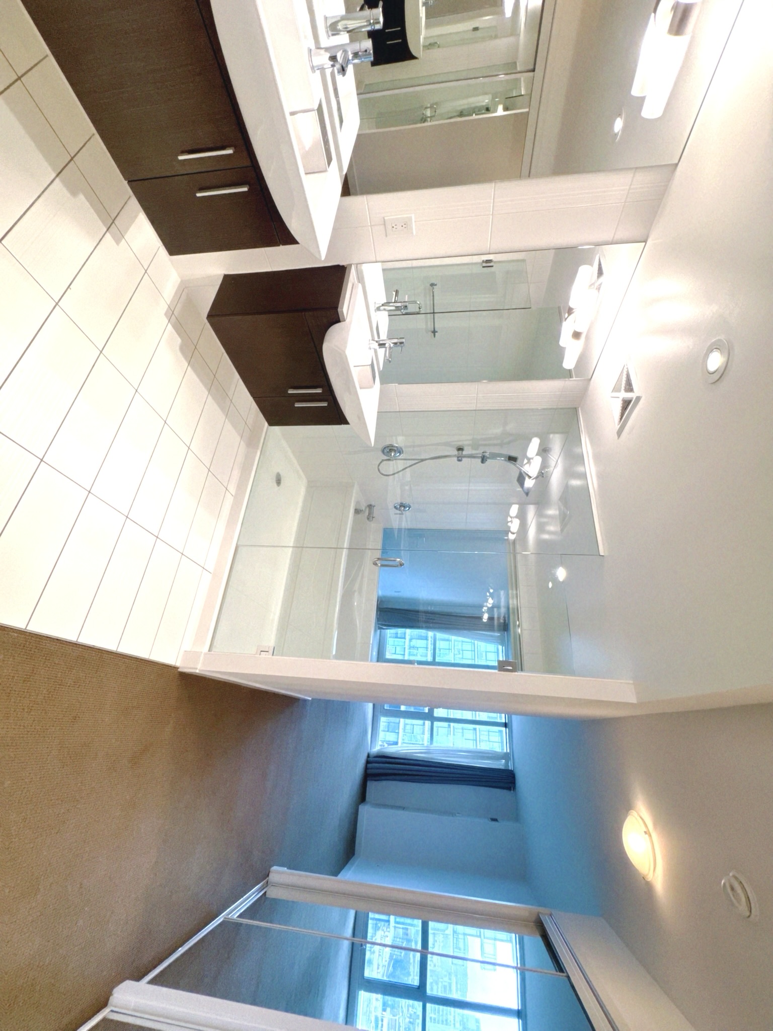 5-piece primary ensuite with double vanity and glass shower