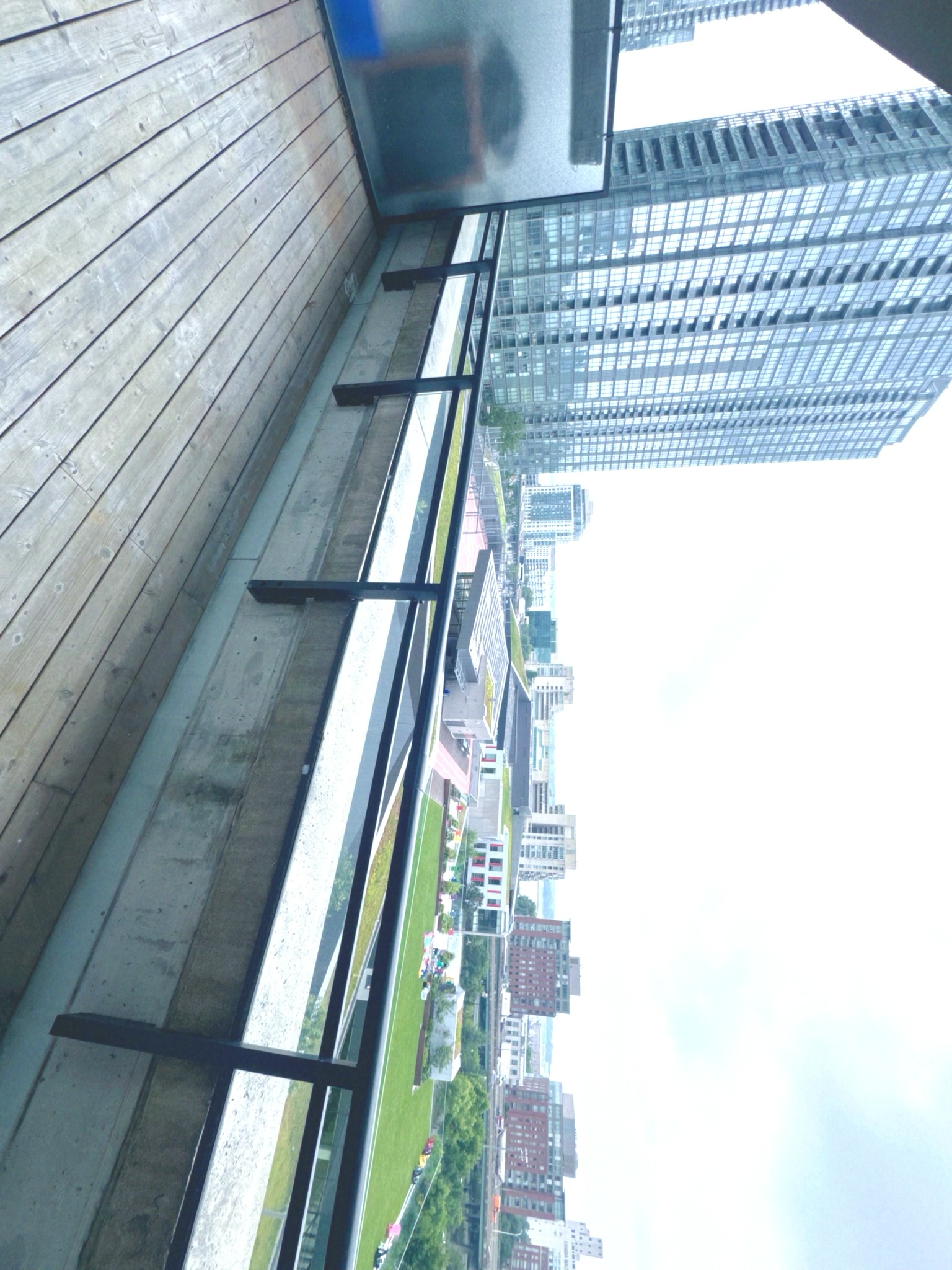 Bright upper level with floor-to-ceiling windows and terrace access