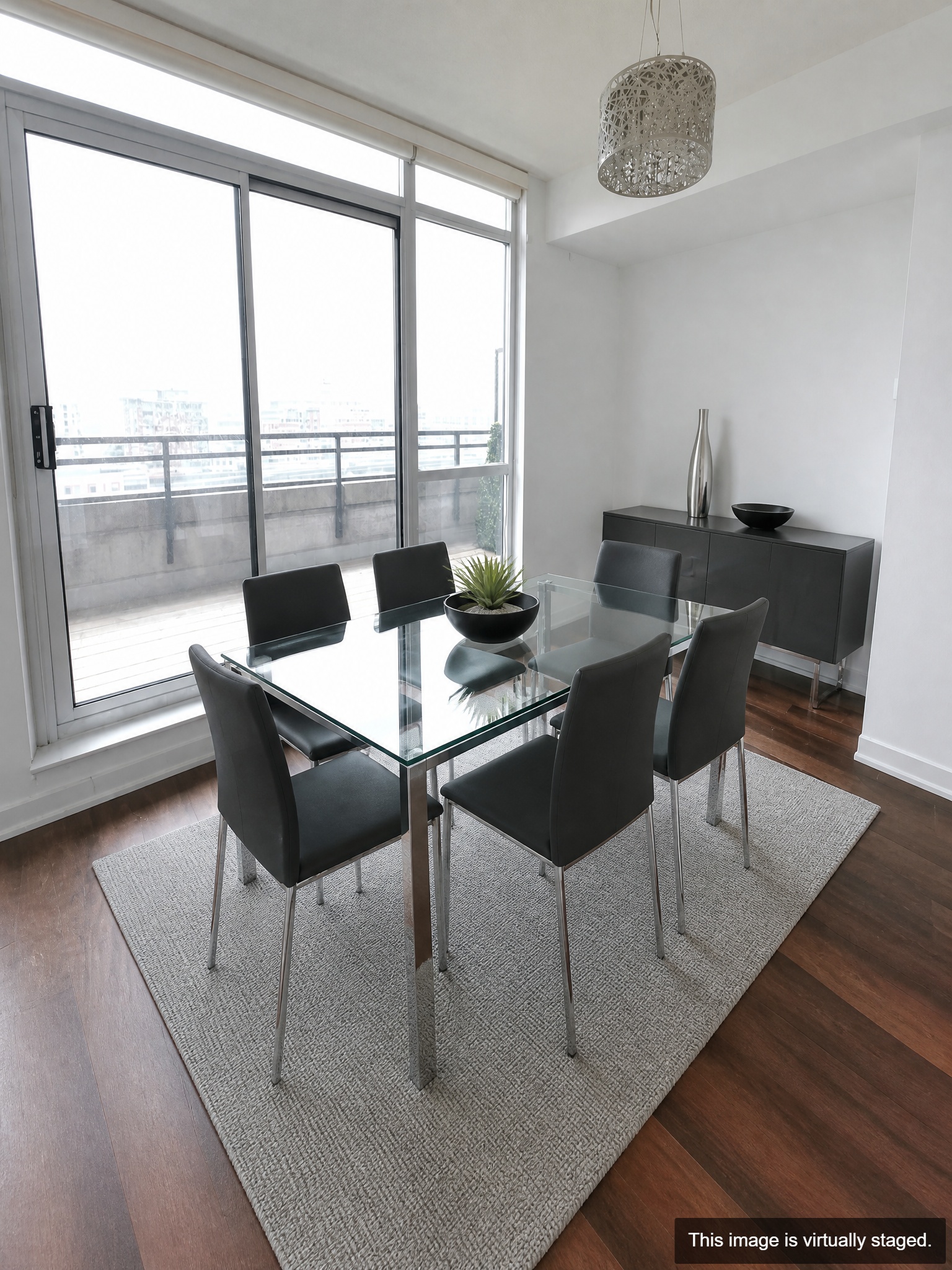 Virtually staged — dining area overlooking park