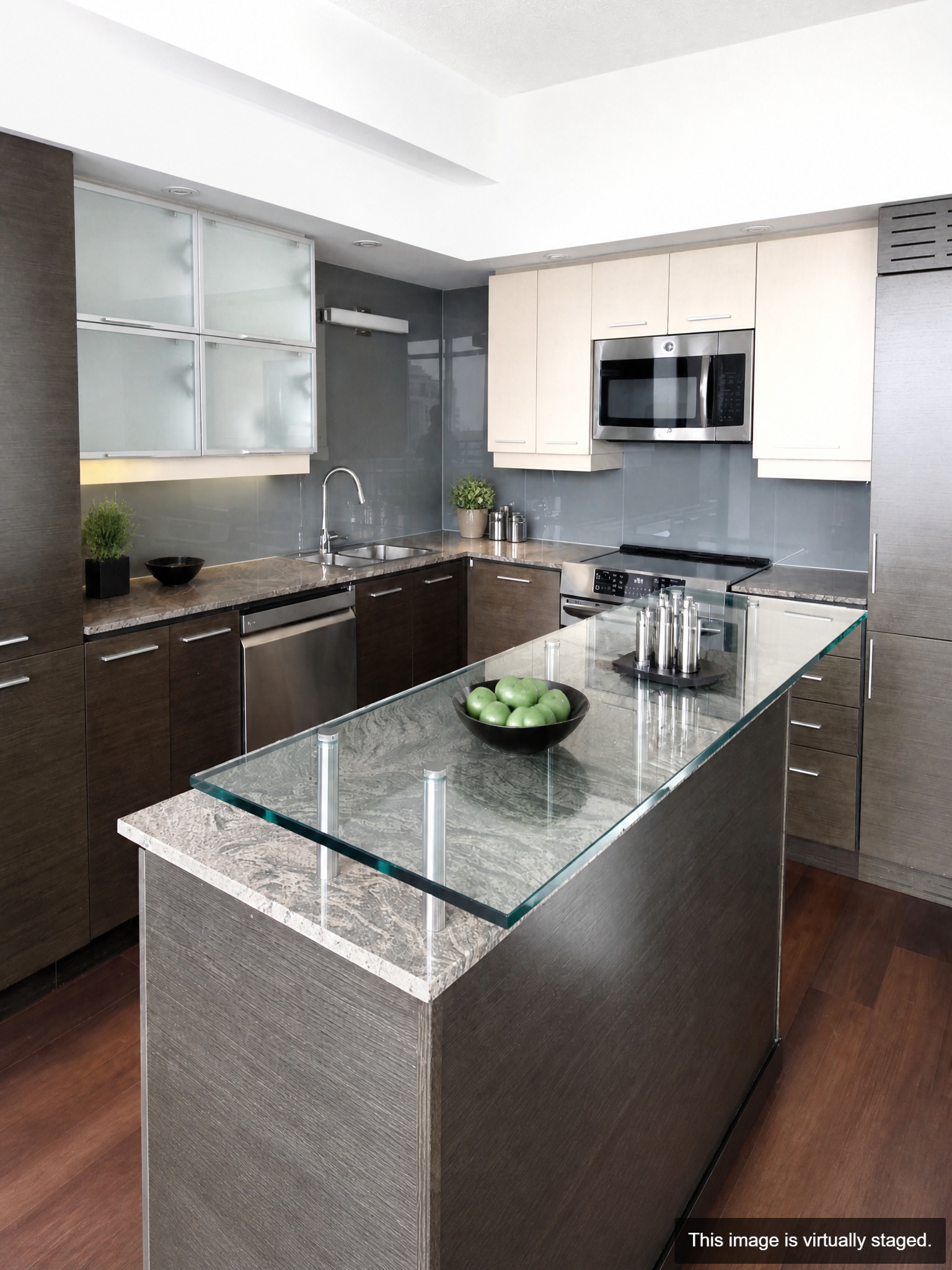 Virtually staged — gourmet kitchen with granite counters and centre island
